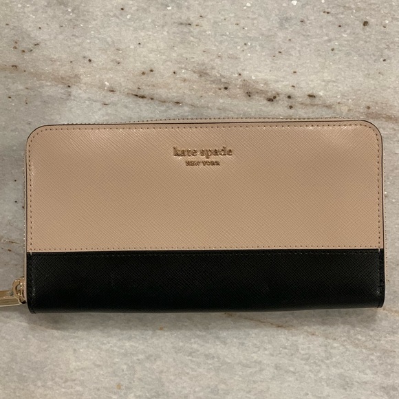 Kate Spade light pink wallet never used with tags, purchased for $188 - Picture 1 of 4